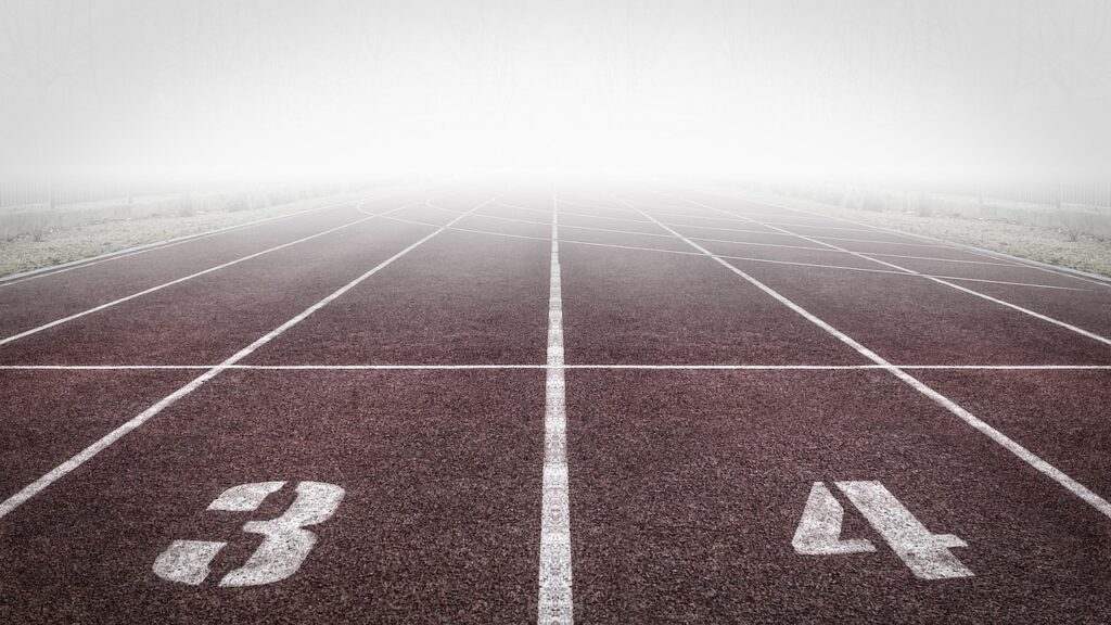 Running track shrouded in fog