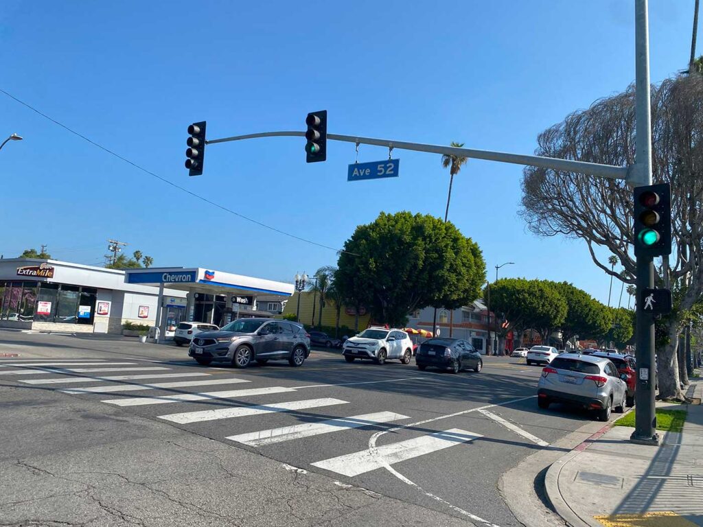 A pedestrian crosswalk at an intersection of Ave 52 in Los Angeles.